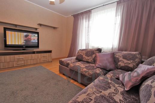 The apartment is fully furnished with modern furniture, equi