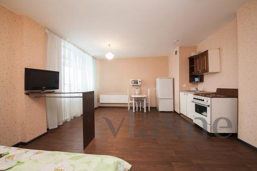 Bright studio in a good area, Krasnoyarsk - apartment by the day