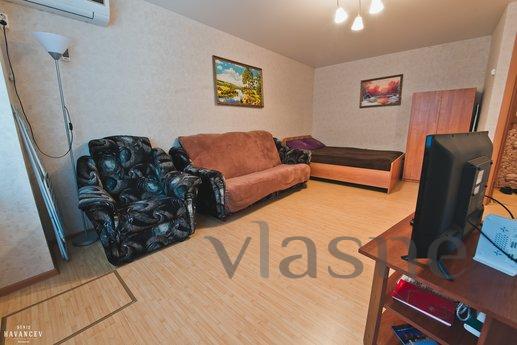 Furniture and other amenities: a double bed, sofa, chair, ta