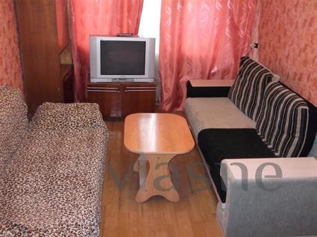 Furniture and other amenities: a double bed, sofa, coffee ta