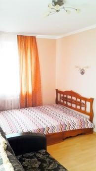 The room has a double bed, sofa bed, LCD TV, air conditionin