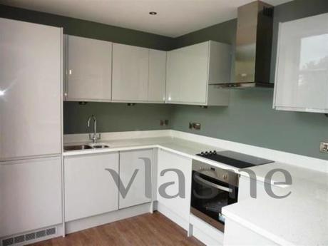 The new and bright one-bedroom apartment is located near the