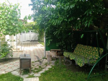 I rent a house in Chernomorsk, in the center of the city wit