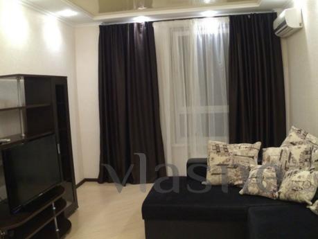 Rent modern apartment in the center of the city for a day an