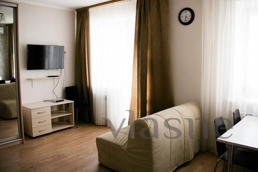 Studio apartment renovated, Omsk - apartment by the day