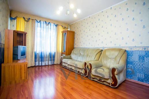 I will rent a spacious apartment in the center of the city. 