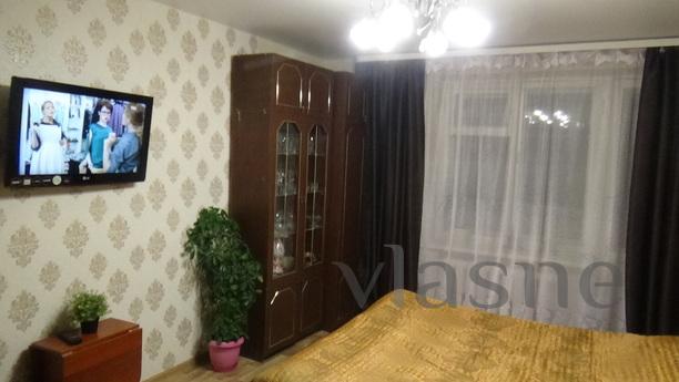 This cozy apartment is located near the train stations and t