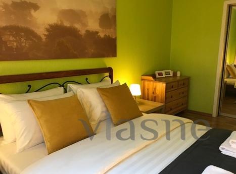 Rent a designer apartment in the status of a residential com
