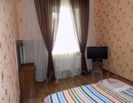 The apartment is located in the city center, on the ground f