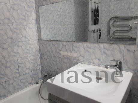 One bedroom apartment in the city center, Yuzhny - apartment by the day