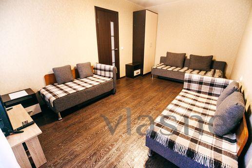 An apartment with 3 separate beds with a good modern renovat