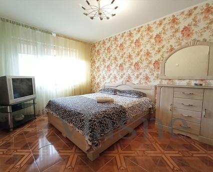 Welcome to a clean and comfortable apartment with a photo th