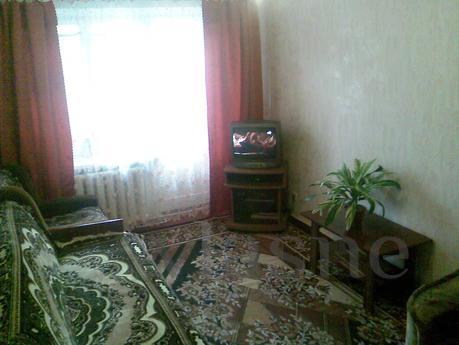 The apartment is located in the city center, close to home p