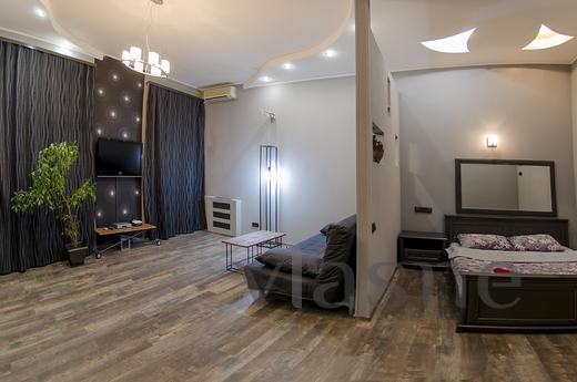 You can rent an apartment in the center of Kiev on Proreznay