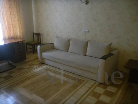The apartment is located in the city center, close to the w 